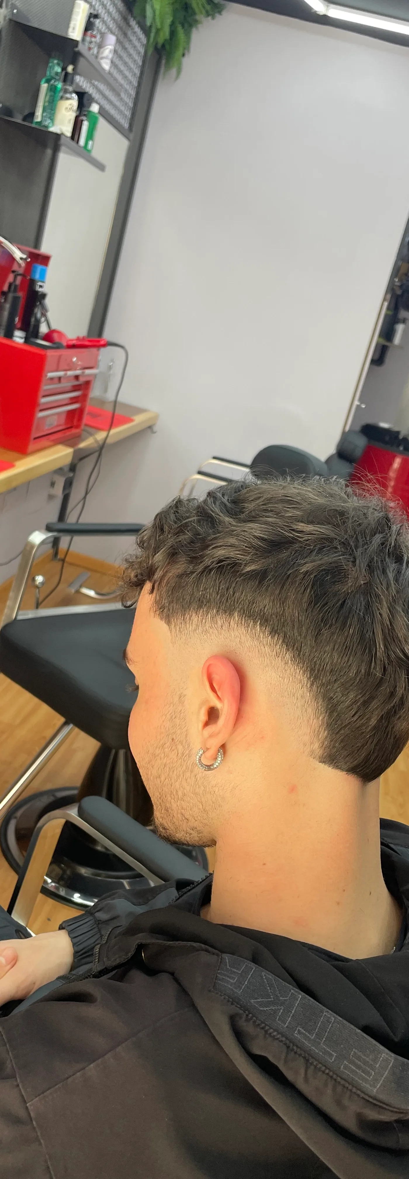 Razor cut con fade graduato
